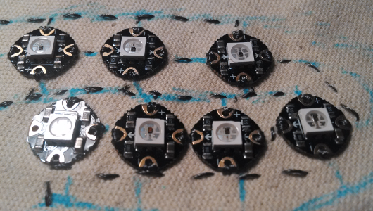 Seven pixels fully stitched into the design.  The bottom pixels, particularly the two in the middle, are quite close together